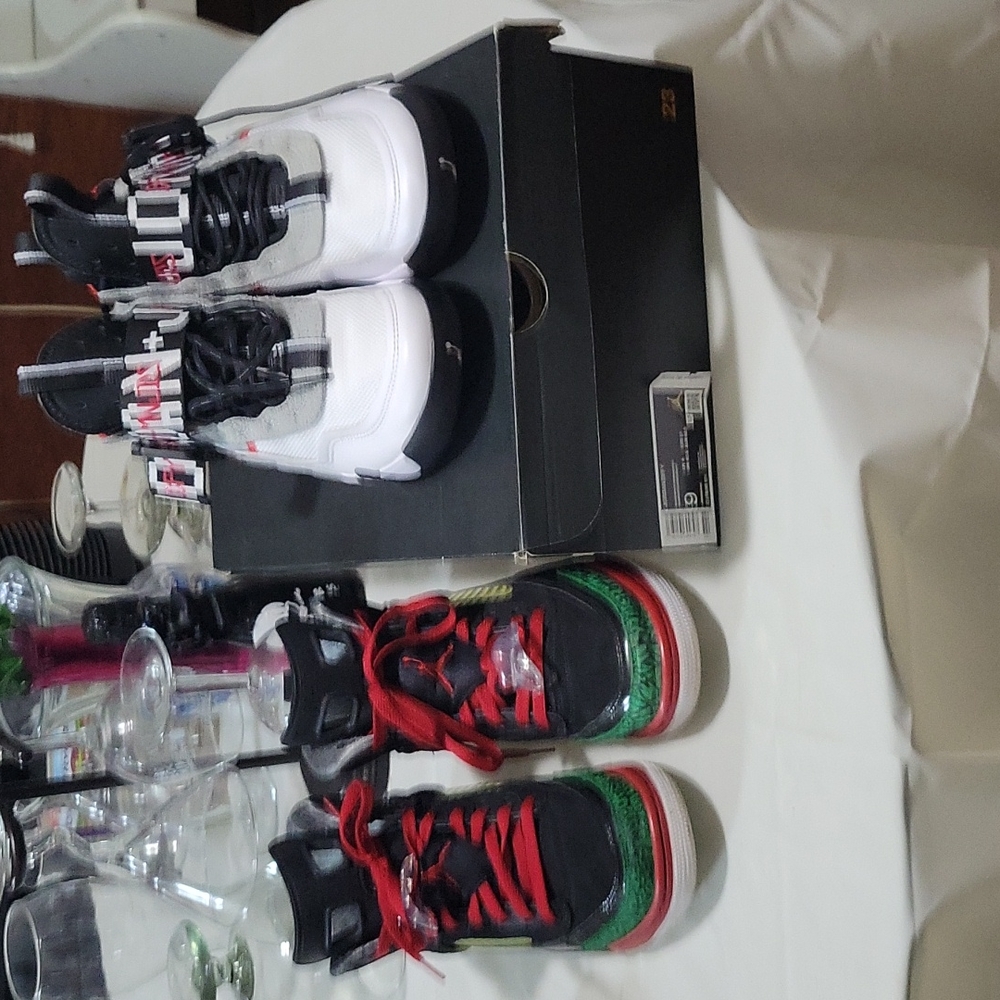Jordan  defy.   Red ,black and green Jordans